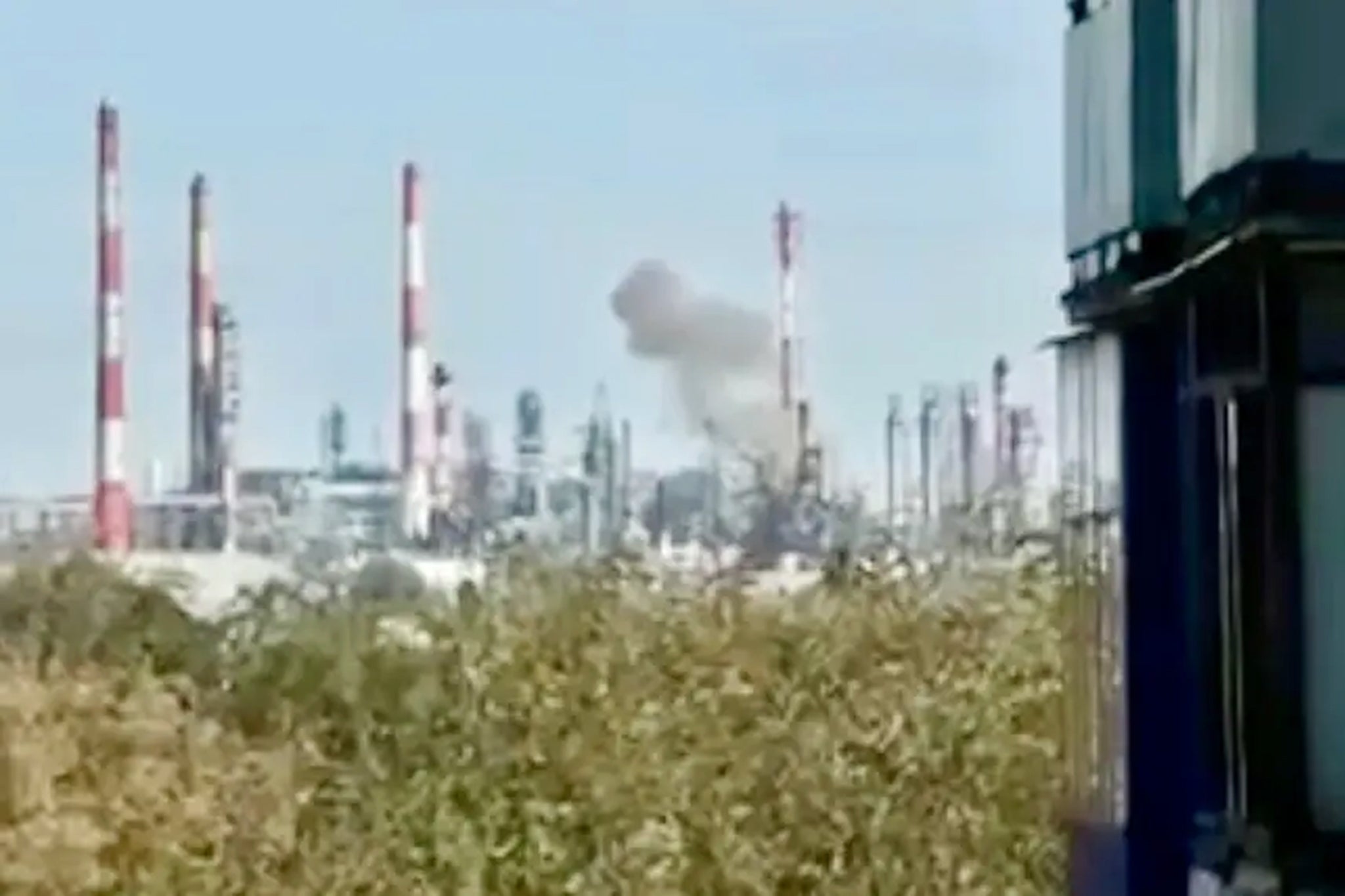 Smoke billows from an oil refinery in Russia on Friday following a Ukrainian drone strike
