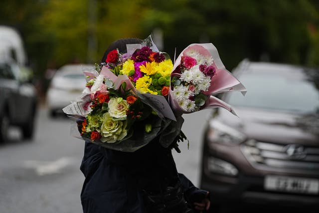 <p>Neighbours paid tribute to the ‘lovely’ and ‘kind’ men killed in the attack</p>
