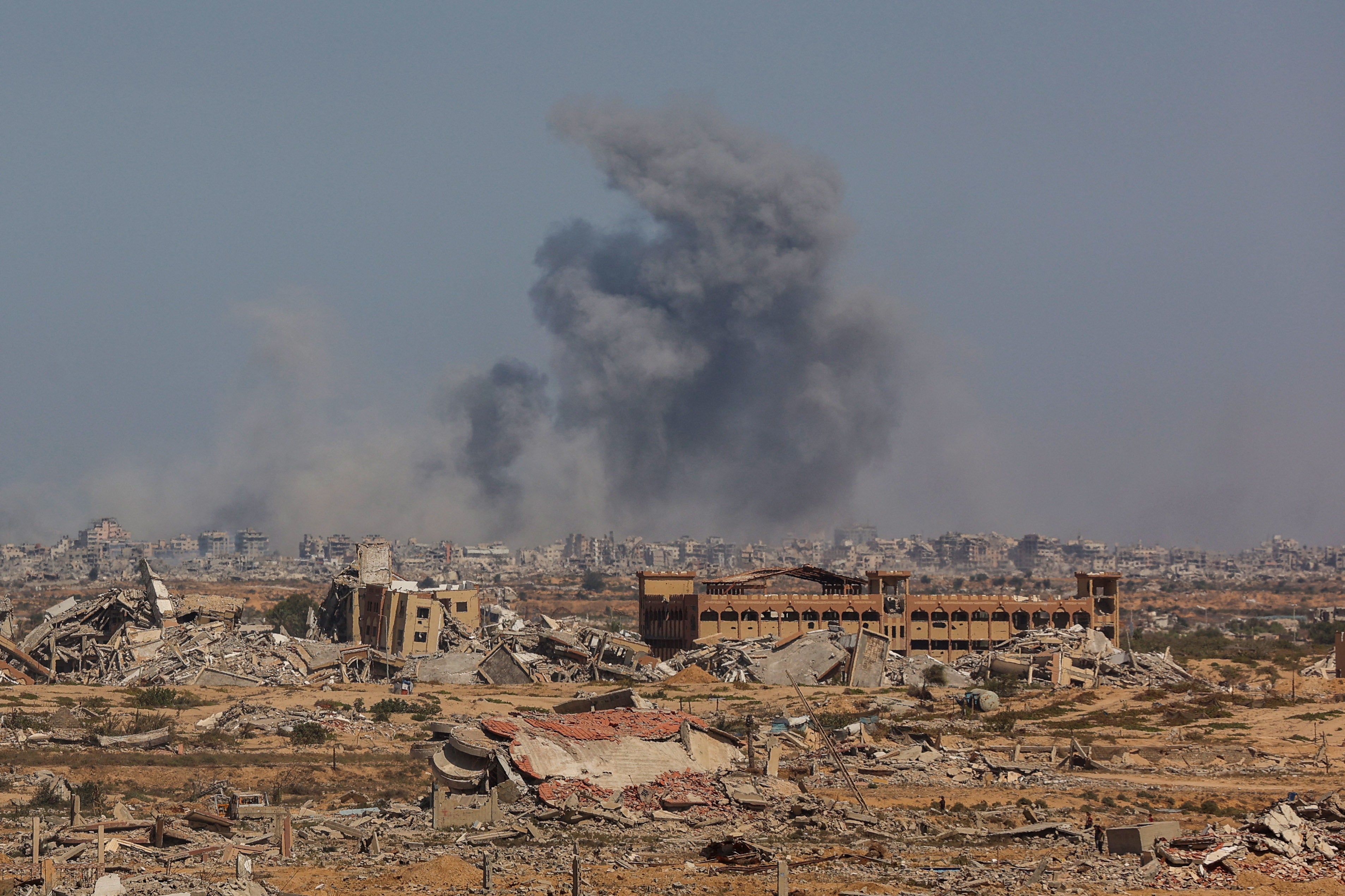 Smoke billows following an Israeli strike in Gaza City, on October 2, 2025, as pictured from Nuseirat in central Gaza, amid the ongoing conflict between Israel and the Palestinian militant group Hamas