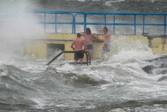 People on Blackrock diving tower in Salthill, Galway (Brian Lawless/PA)