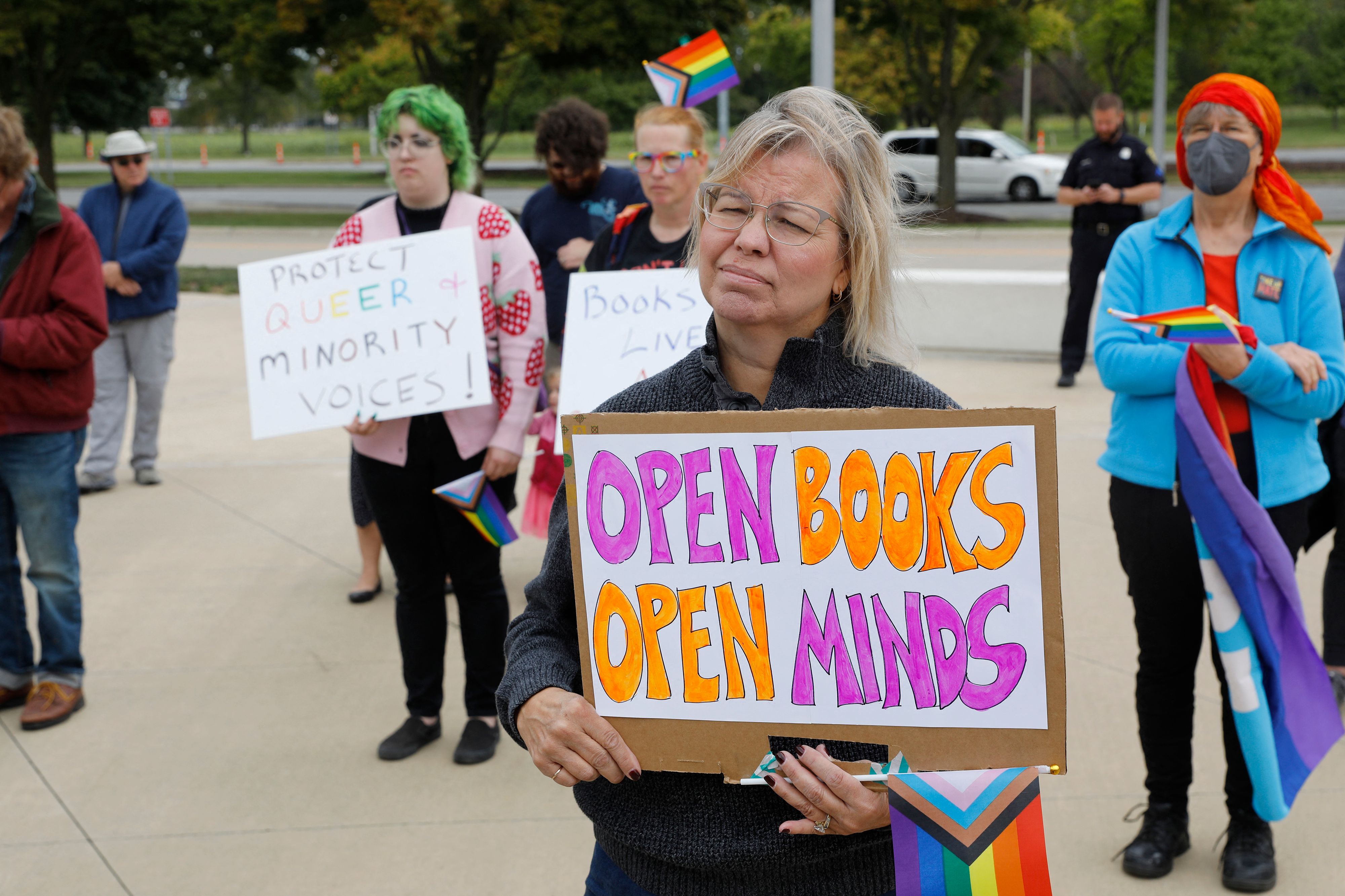 Demonstrators gather to protest against banning books outside of the Henry Ford Centennial Library in Dearborn, Michigan, in 2022