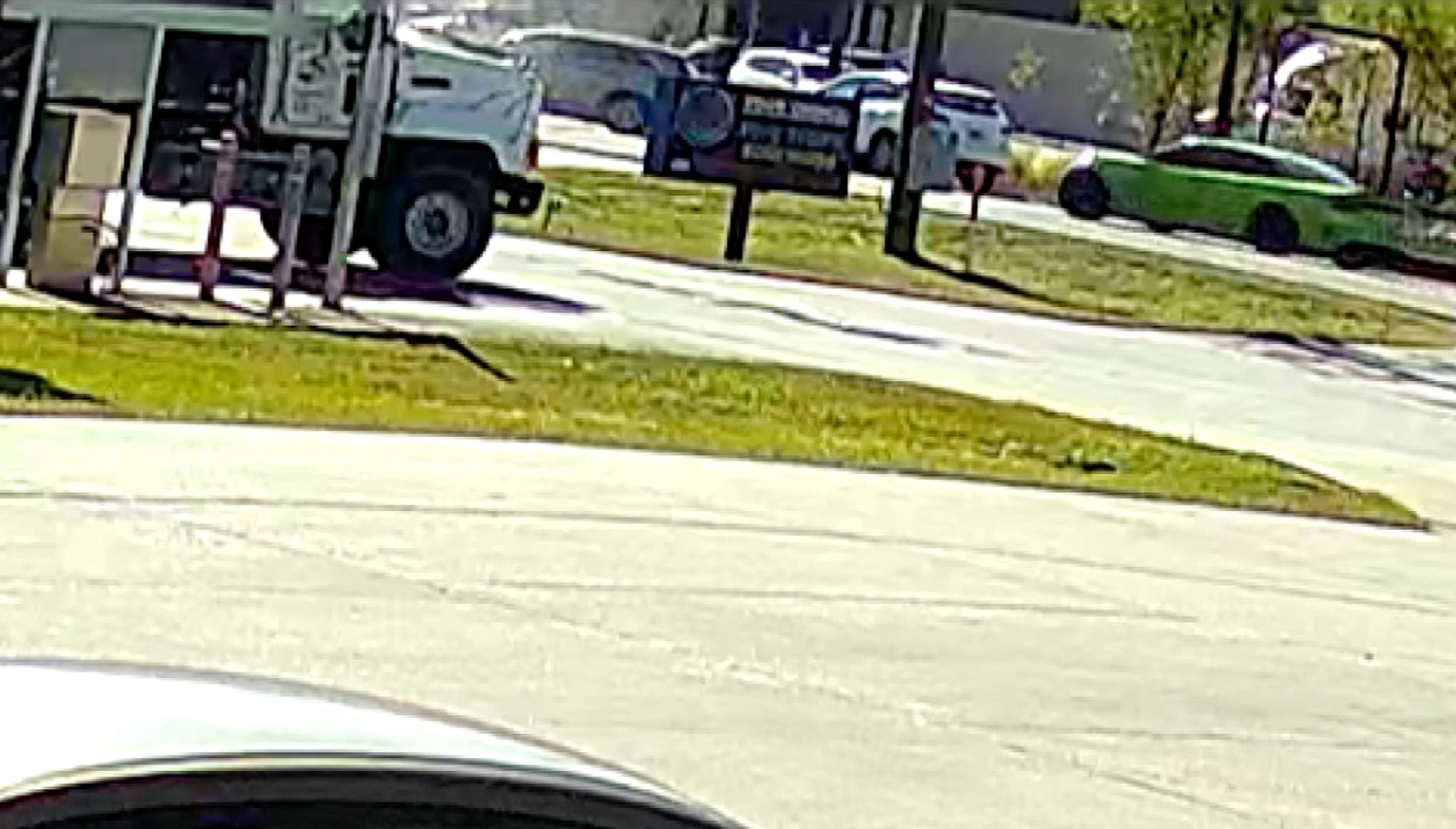 Surveillance footage shows Kyren Lacy, driving the green Dodge Charger, was 72.6 yards behind the vehicles at the time of the fatal crash, his attorney says