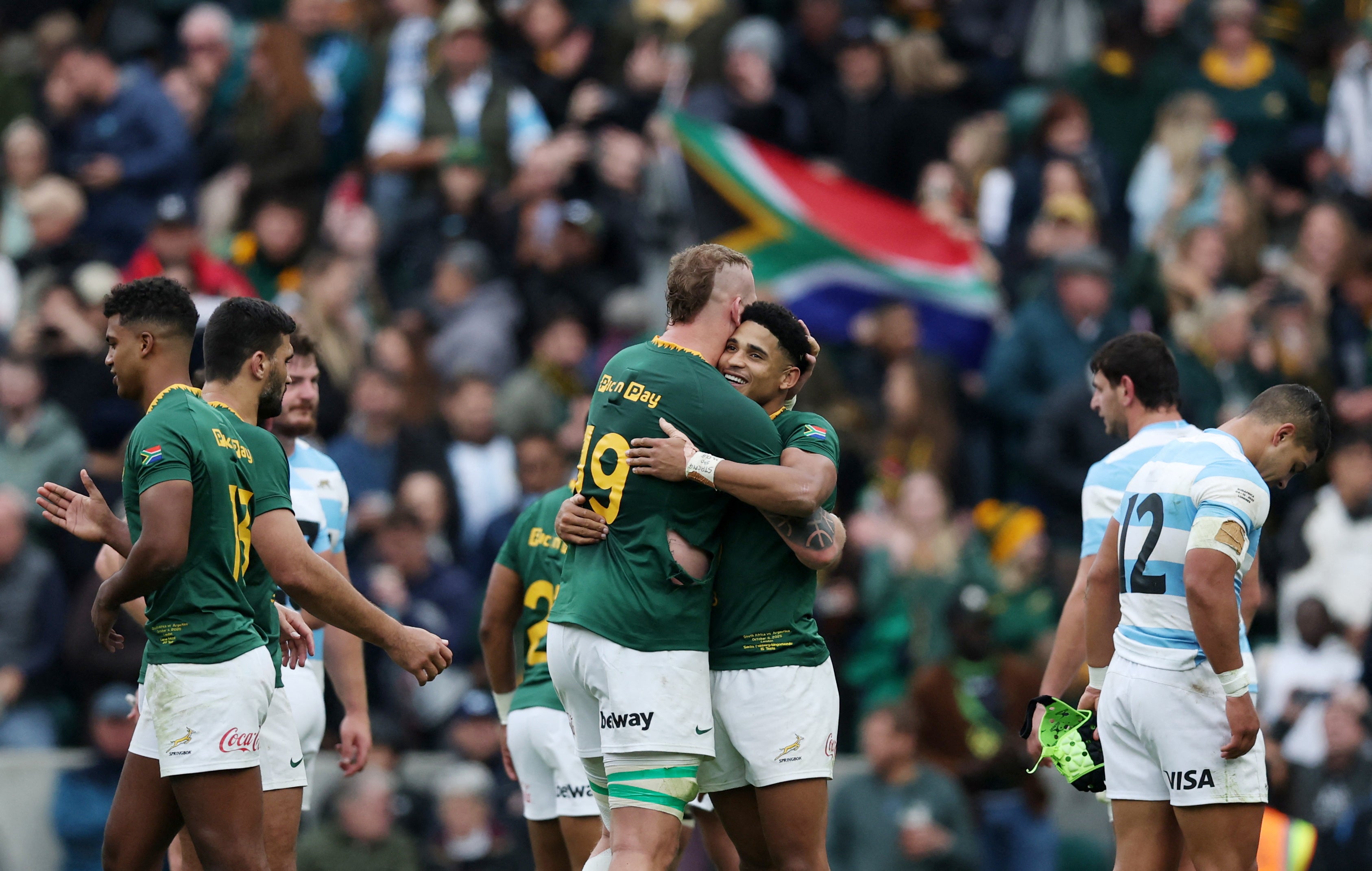 The Springboks celebrated a brutal win in front of a raucous Twickenham crowd