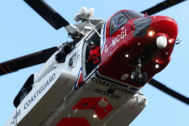 A coastguard helicopter went to the scene (Andrew Milligan/PA)