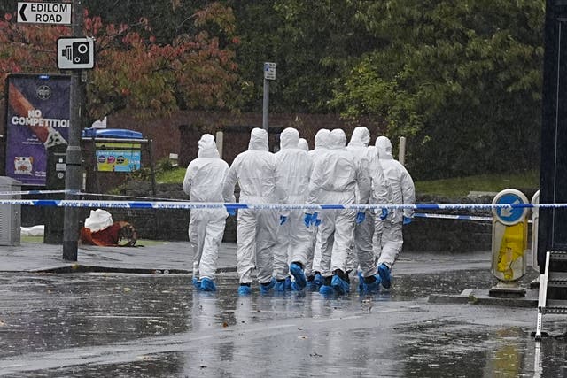 Police are investigating the scene of the terror attack in which two men died (Peter Byrne/PA)