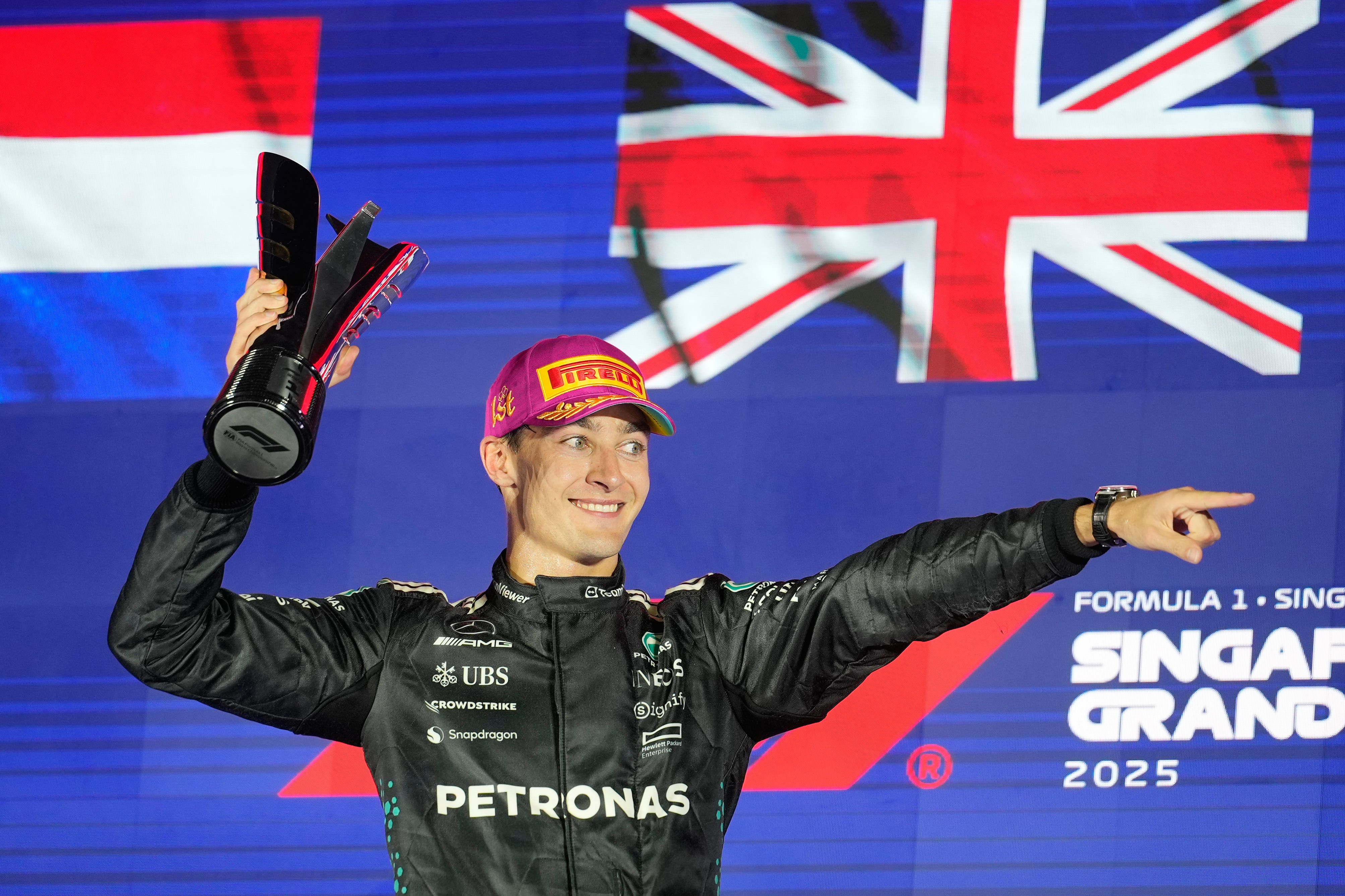 Mercedes driver George Russell celebrates winning the Singapore Grand Prix (Vincent Thian/AP).