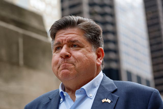 <p>Governor JB Pritzker said it was ‘shameful’ that federal law enforcement used aggressive military-style tactics to arrest 37 immigrants at a Chicago apartment building in the middle of the night </p>