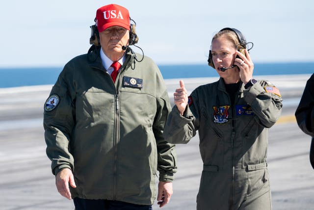 <p>President Donald Trump visits the USS George H.W. Bush aircraft carrier which is out at sea near Norfolk, Virginia, October 5, 2025, as he travels to see a Naval demonstration as part of the US Navy's 250th anniversary celebration</p>