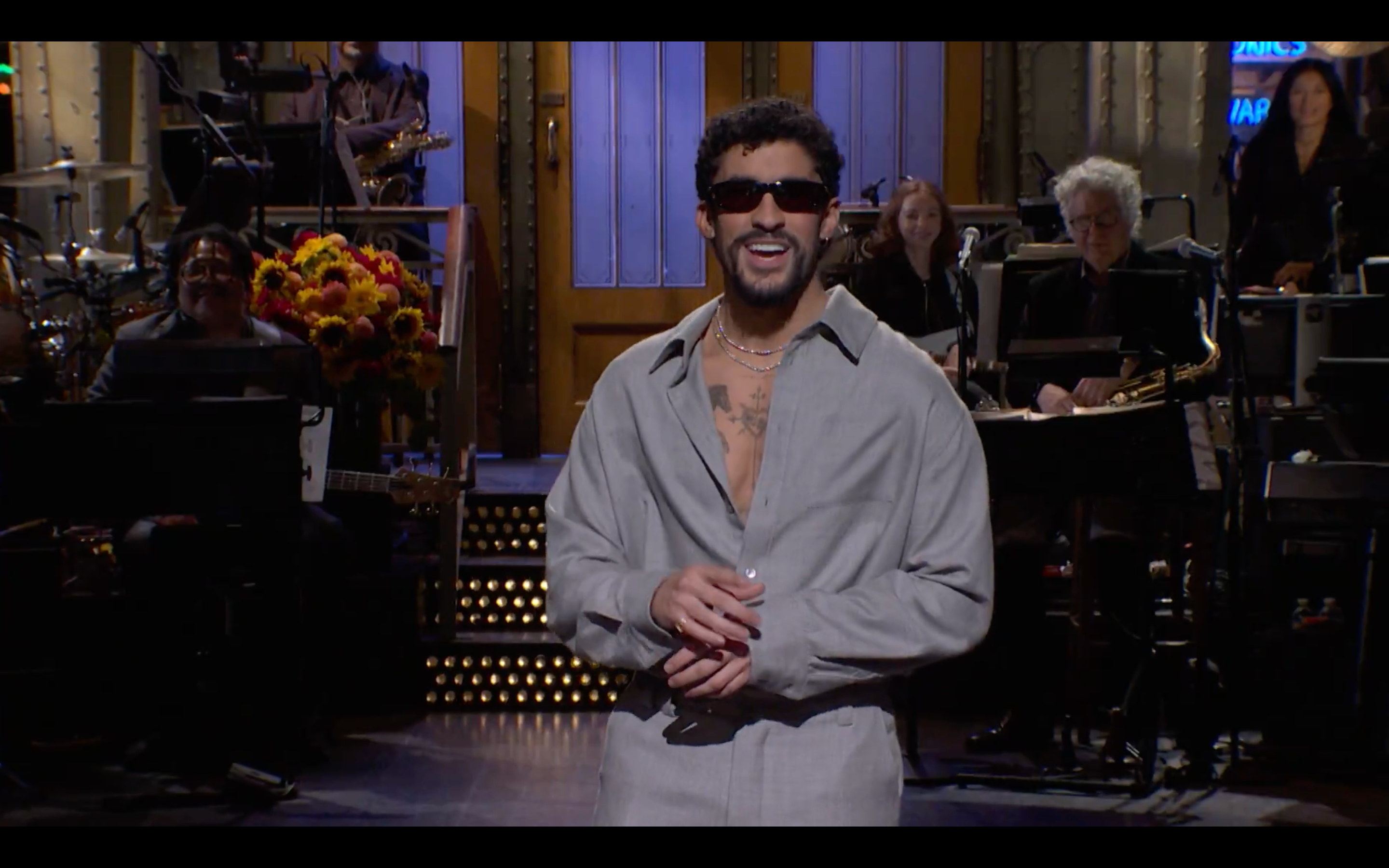 Puerto Rican superstar Bad Bunny, the host of SNL's Season 51 premiere, joked that 'everyone is happy' that he's performing at the Super Bowl halftime show