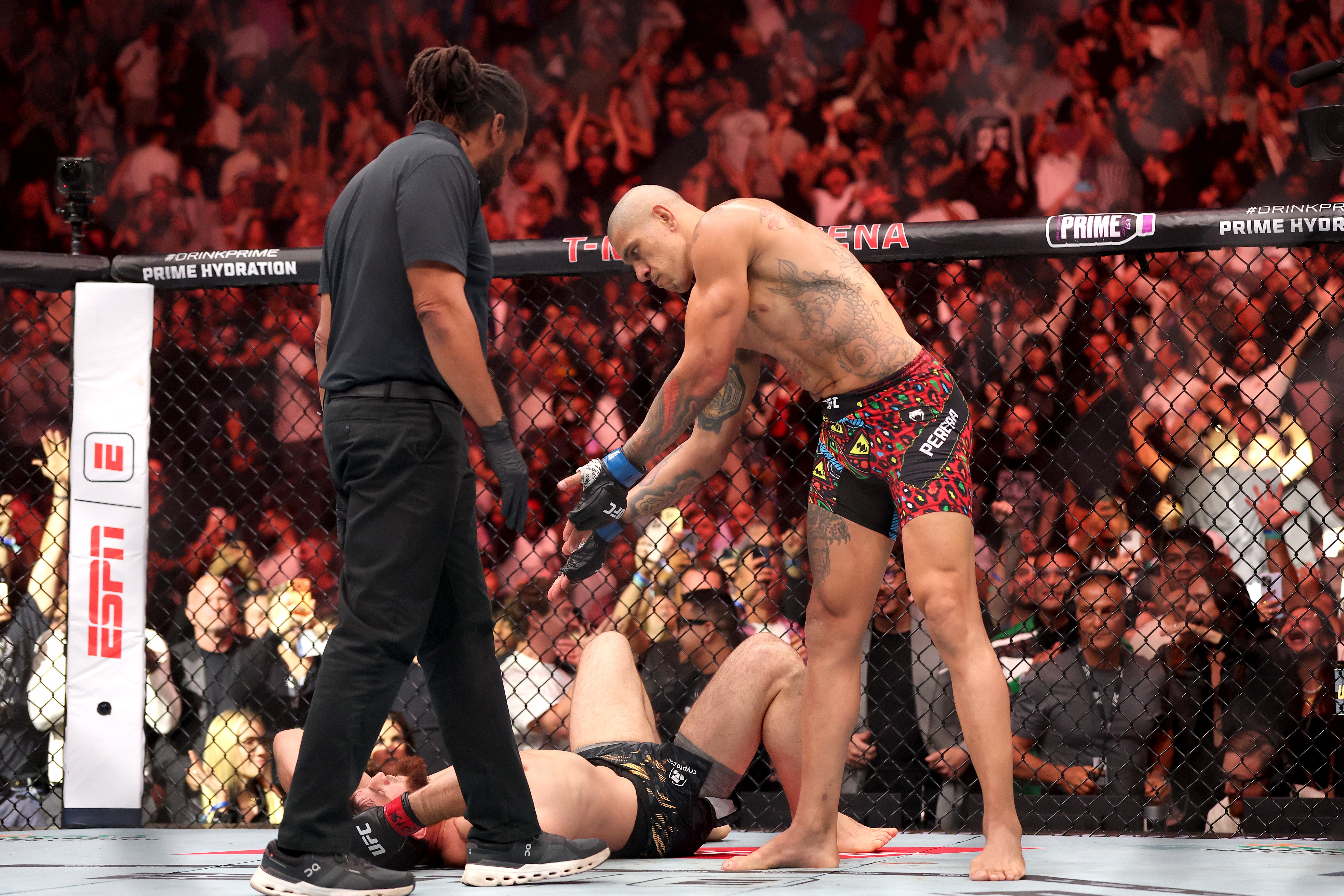 Alex Pereira celebrates his quickfire stoppage of Magomed Ankalaev