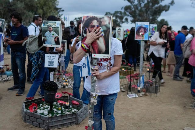 <p>People visit the site of the Nova music festival, where hundreds of revellers were killed and abducted by Hamas and taken into Gaza, on the first anniversary of the attack, near Kibbutz Reim, southern Israel, 7 October 2024</p>