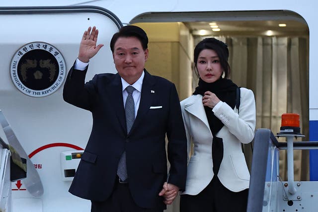 <p>File photo: Former South Korean president Yoon Suk Yeol and his wife Kim Keon Hee at London Stansted Airport in 2023</p>