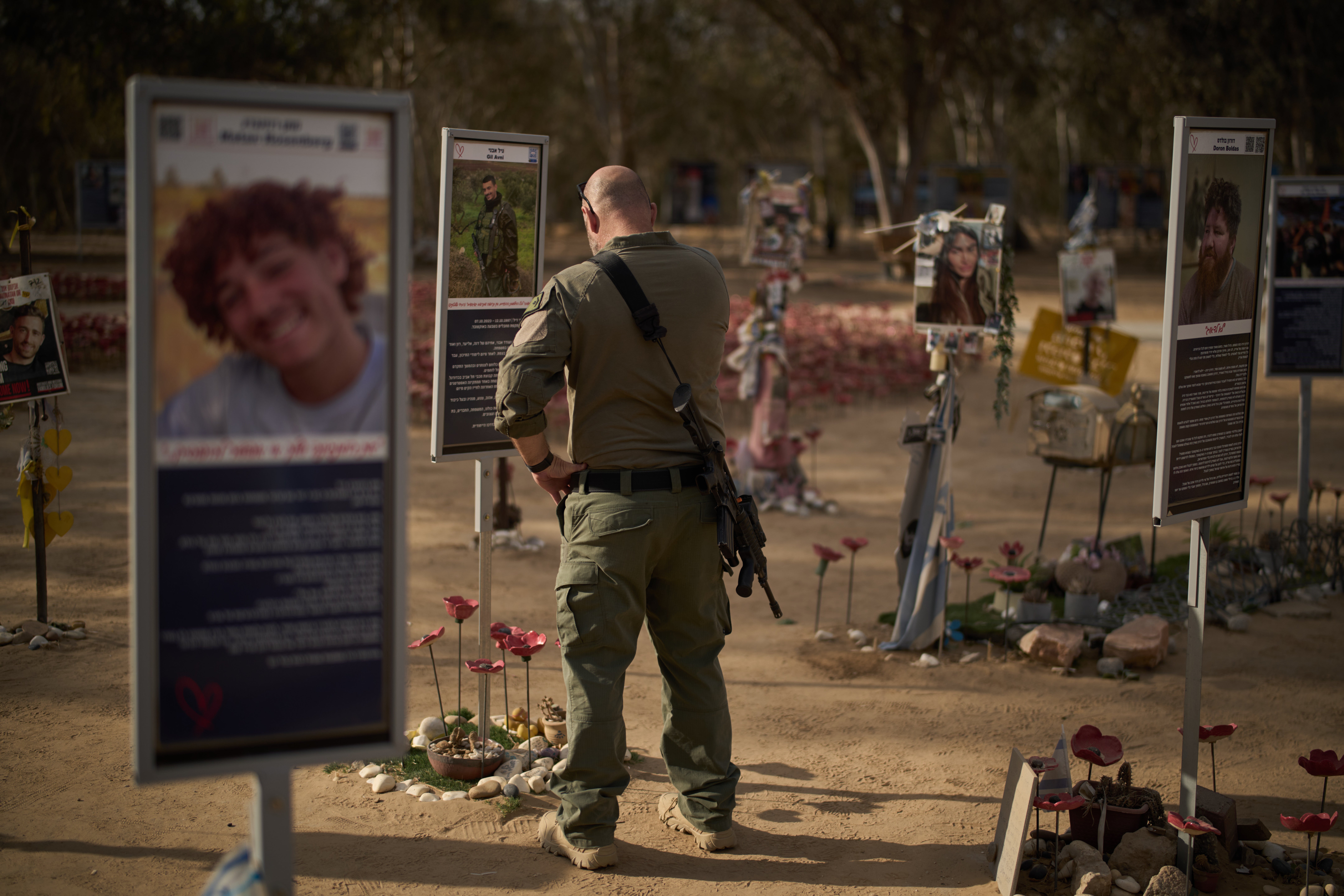 An Israeli soldier visits the site where revellers were killed and kidnapped on 7 October 2023, cross-border attack by Hamas militants at the Nova music festival near the Kibbutz Reim, southern Israel, on 6 October 2025