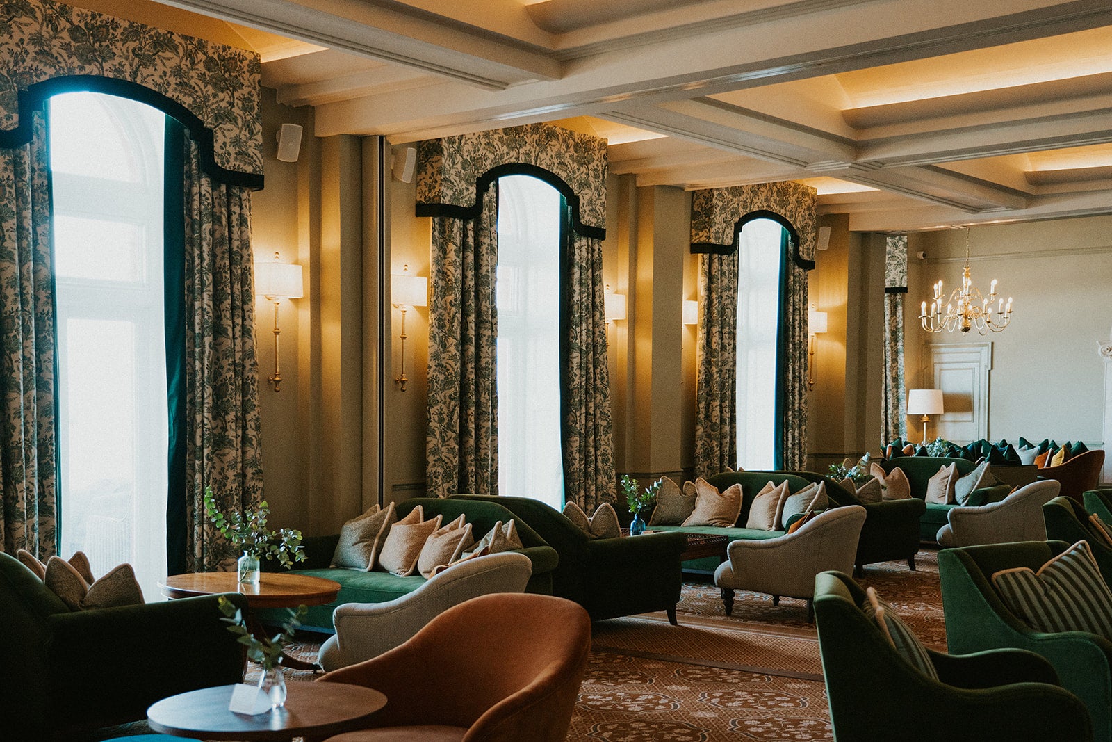 Velvet sofas line The Ballroom at The Headland