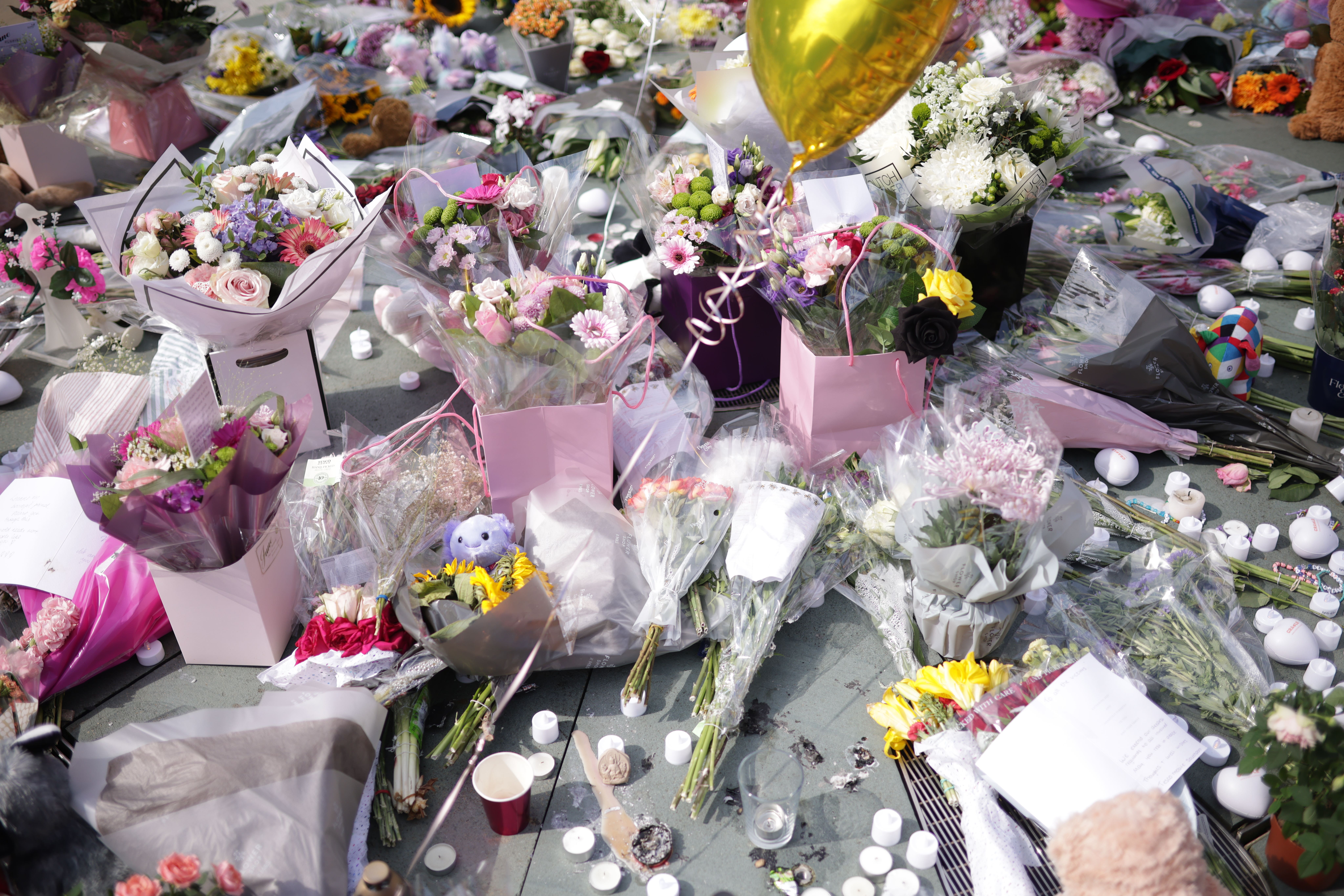 Flowers and tributes outside the Atkinson Art Centre Southport following the attack (James Speakman/PA)