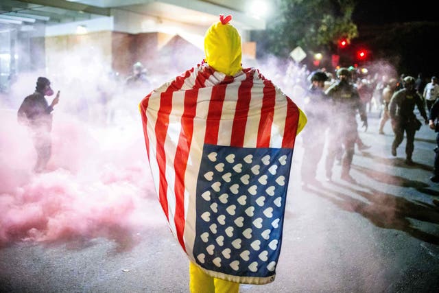 <p>A costumed protester takes part in demonstrations against a proposed National Guard deployment to Portland, Oregon, on Sunday October 5 2025</p>