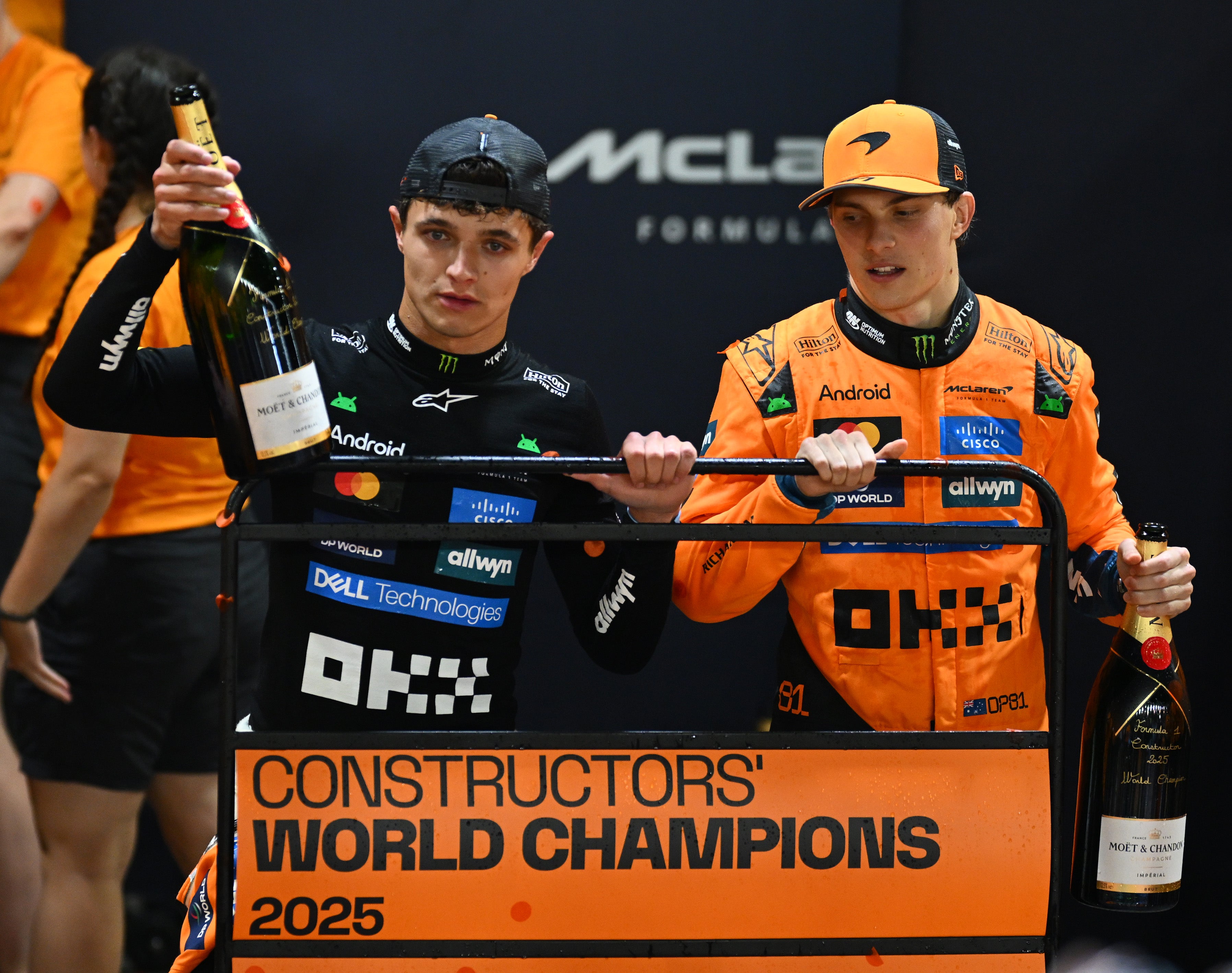 <p>Lando Norris and Oscar Piastri celebrate McLaren's Constructors' Championship</p>