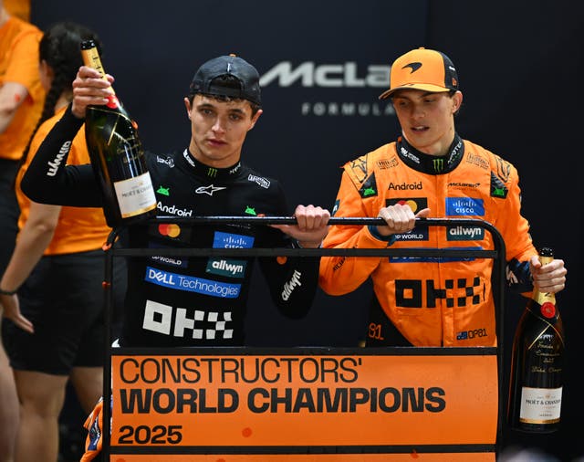 <p>Lando Norris and Oscar Piastri celebrate McLaren's Constructors' Championship</p>