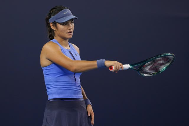 <p>Emma Raducanu shook hands with her opponent when trailing 6-1 4-1 (Andy Wong/AP)</p>
