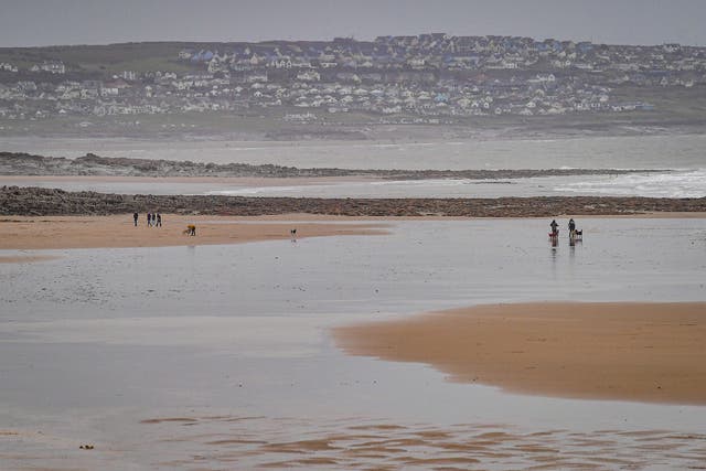 The man was rescued from rough seas by Porthcawl RNLI (Ben Birchall/PA)