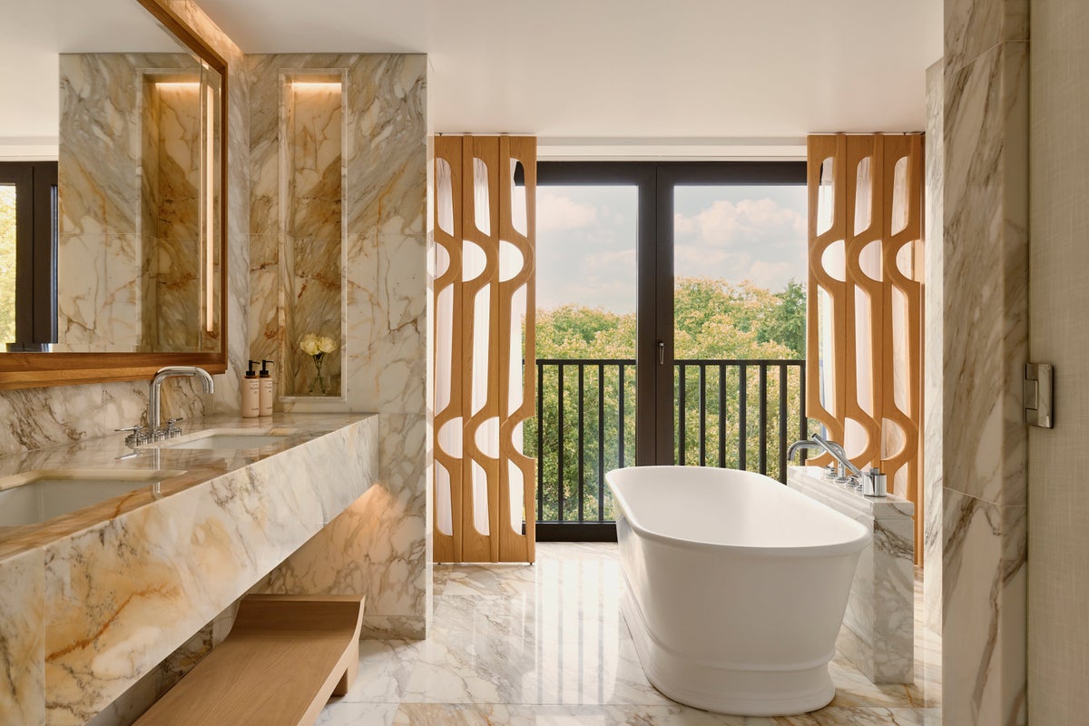 Italian marble-clad bathrooms in The Berkeley bedrooms
