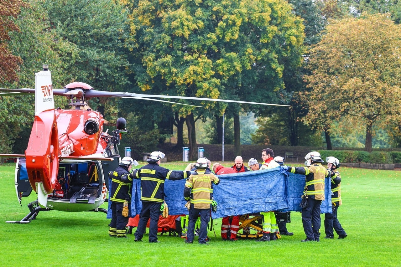 Emergency services and a rescue helicopter are seen after the incident