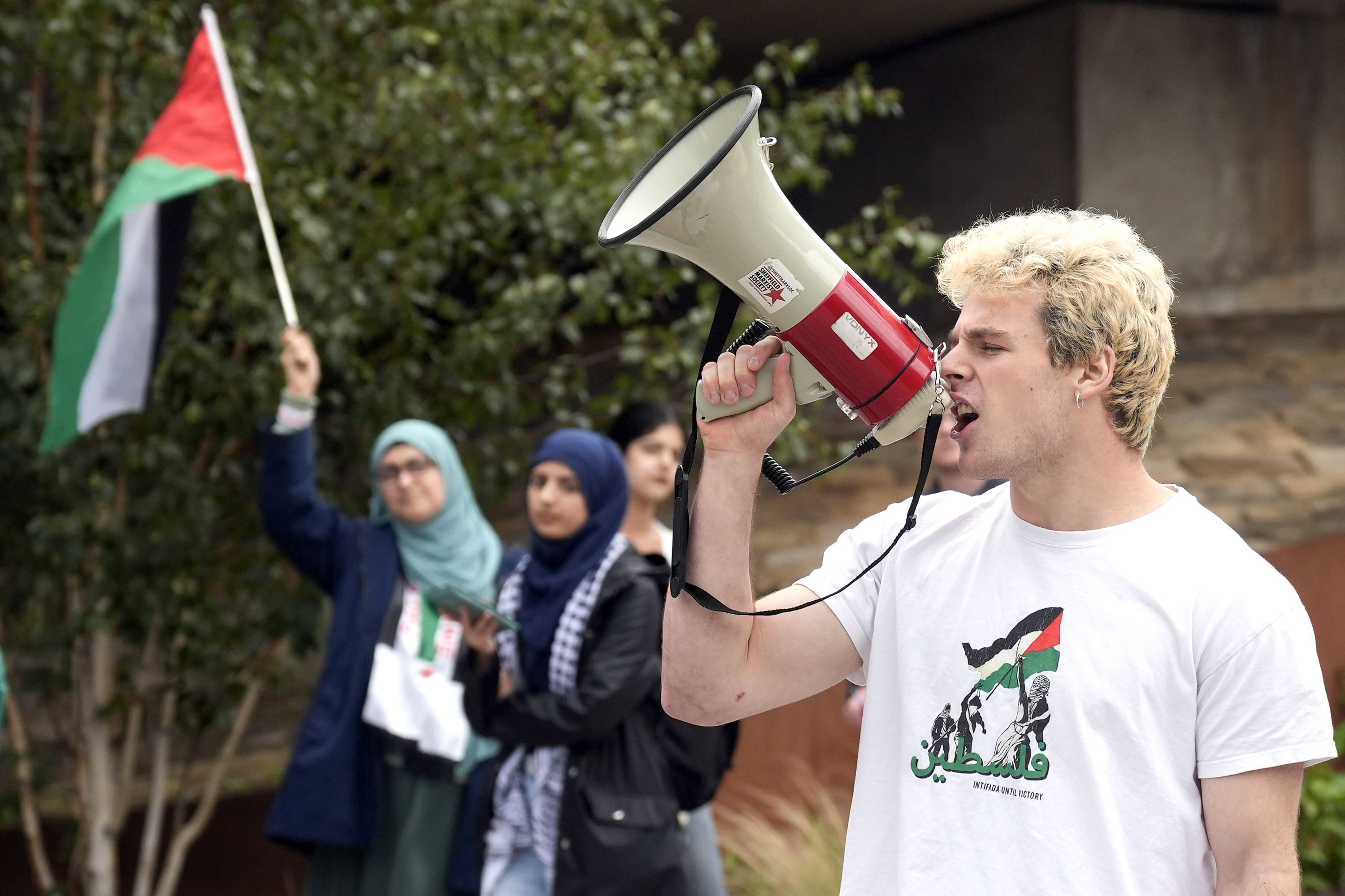 Member of the Revolutionary Communist Party, Anton Parocki, speaks as part of a rally at Sheffield University (PA)