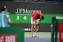Tennis star collapses on court after struggling with humid conditions