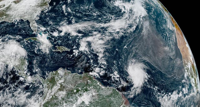 <p>Tropical Storm Jerry is seen moving across the central tropical Atlantic. The storm formed Tuesday</p>