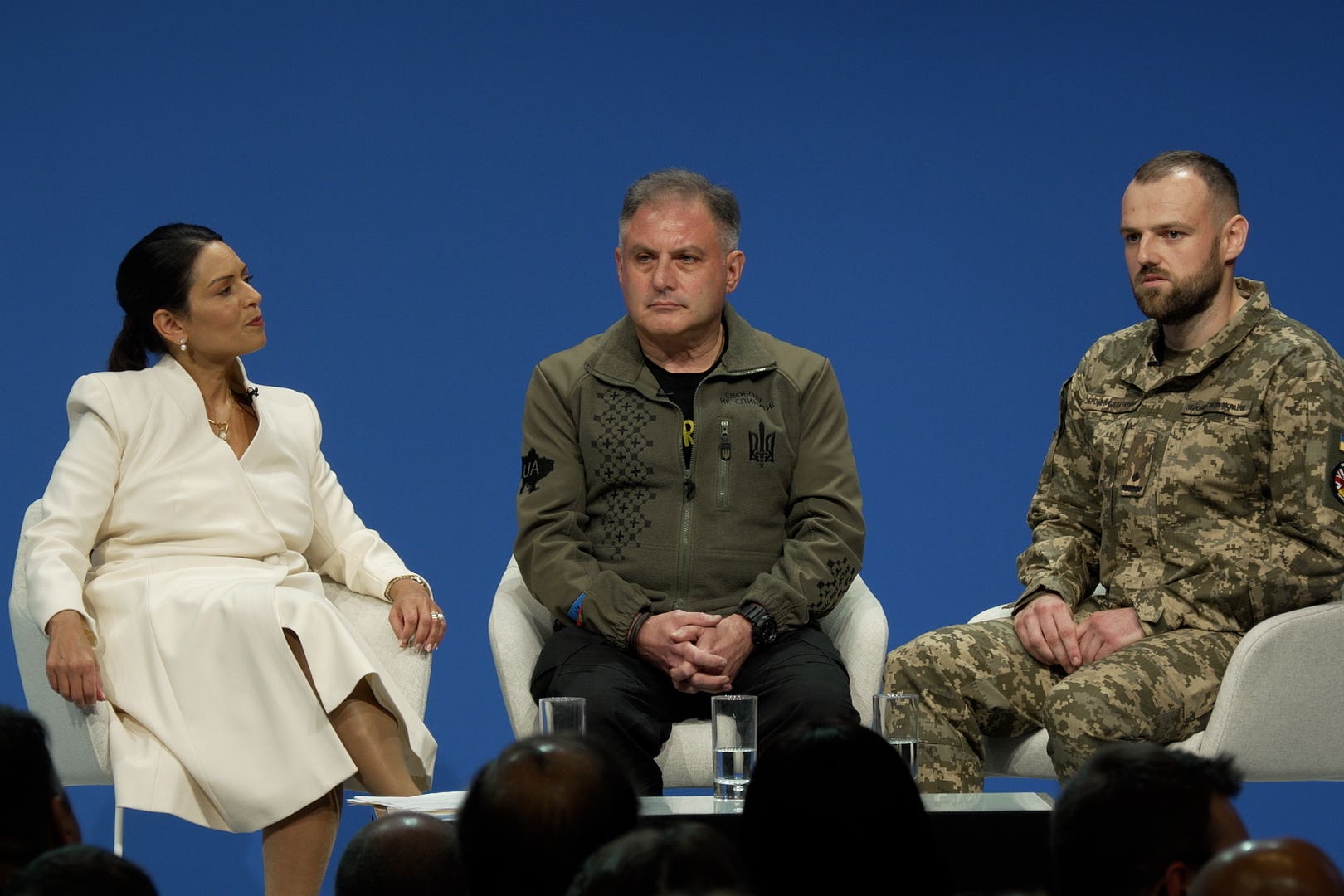 Shadow foreign secretary Dame Priti Patel, Jack Lopresti, and Ukrainian Major Pavlo taking part in a panel discussion during the Conservative Party Conference at the Manchester Central Convention Complex (PA/Nick Warren)