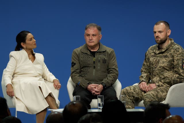 Shadow foreign secretary Dame Priti Patel, Jack Lopresti, and Ukrainian Major Pavlo taking part in a panel discussion during the Conservative Party Conference at the Manchester Central Convention Complex (PA/Nick Warren)