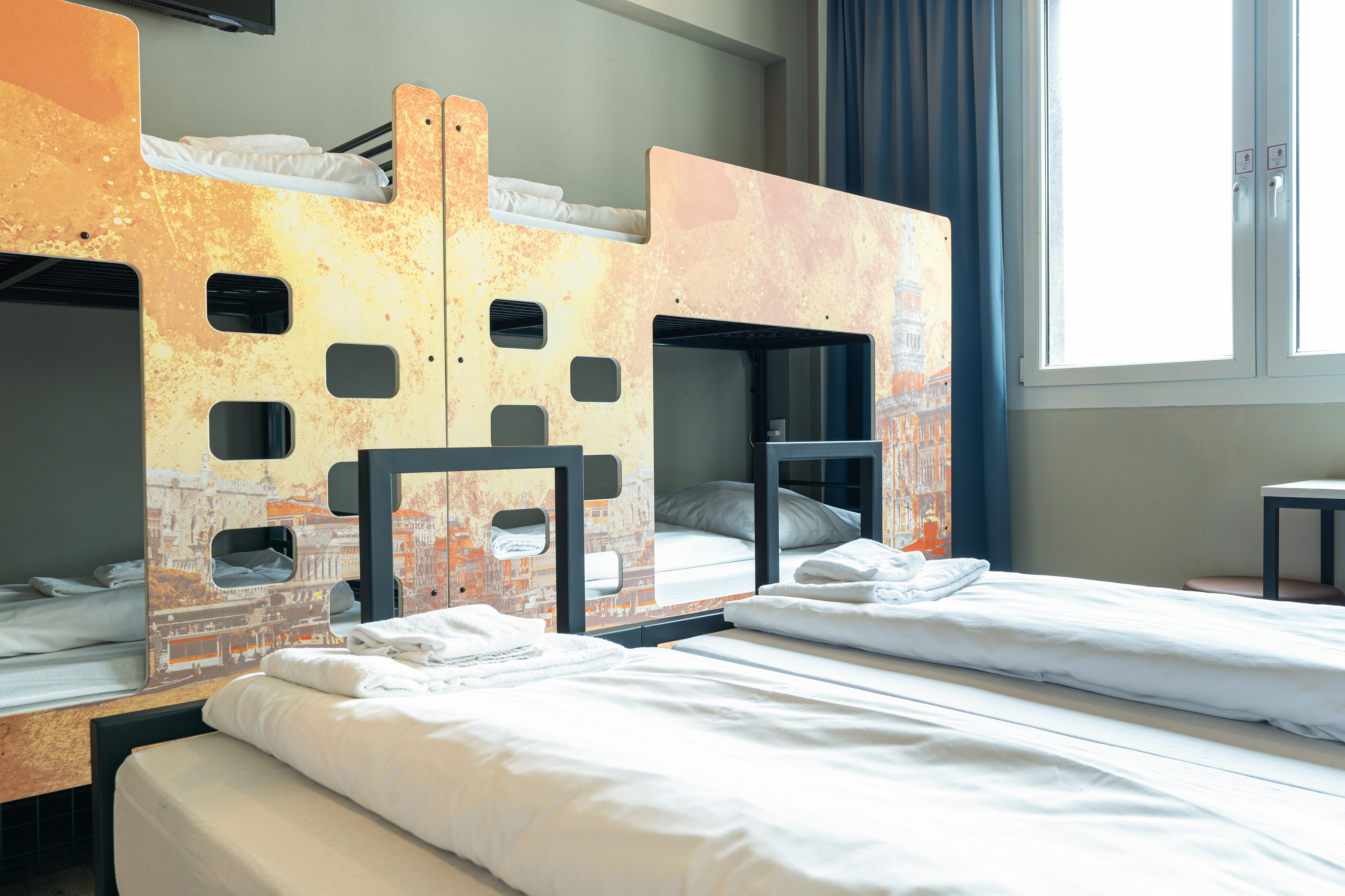 Stay just outside of Venice city centre to save money