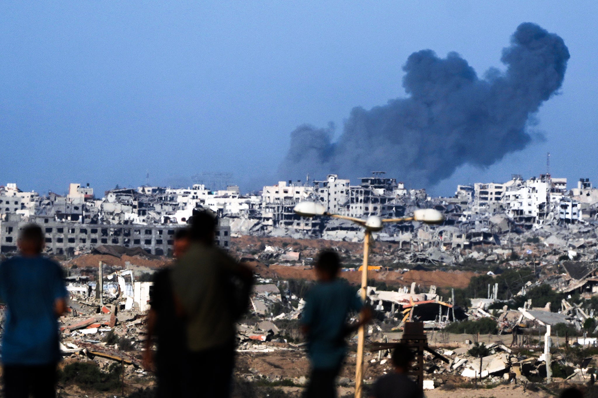 Smoke rises from an Israeli airstrike on Gaza City on October 7. Trump said he might visit the war-torn territory