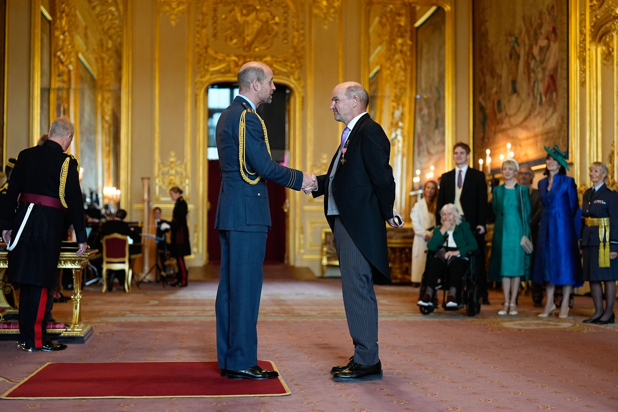 Stephen Lambert, meets the Prince of Wales, as he's made an Officer of the Order of the British Empire