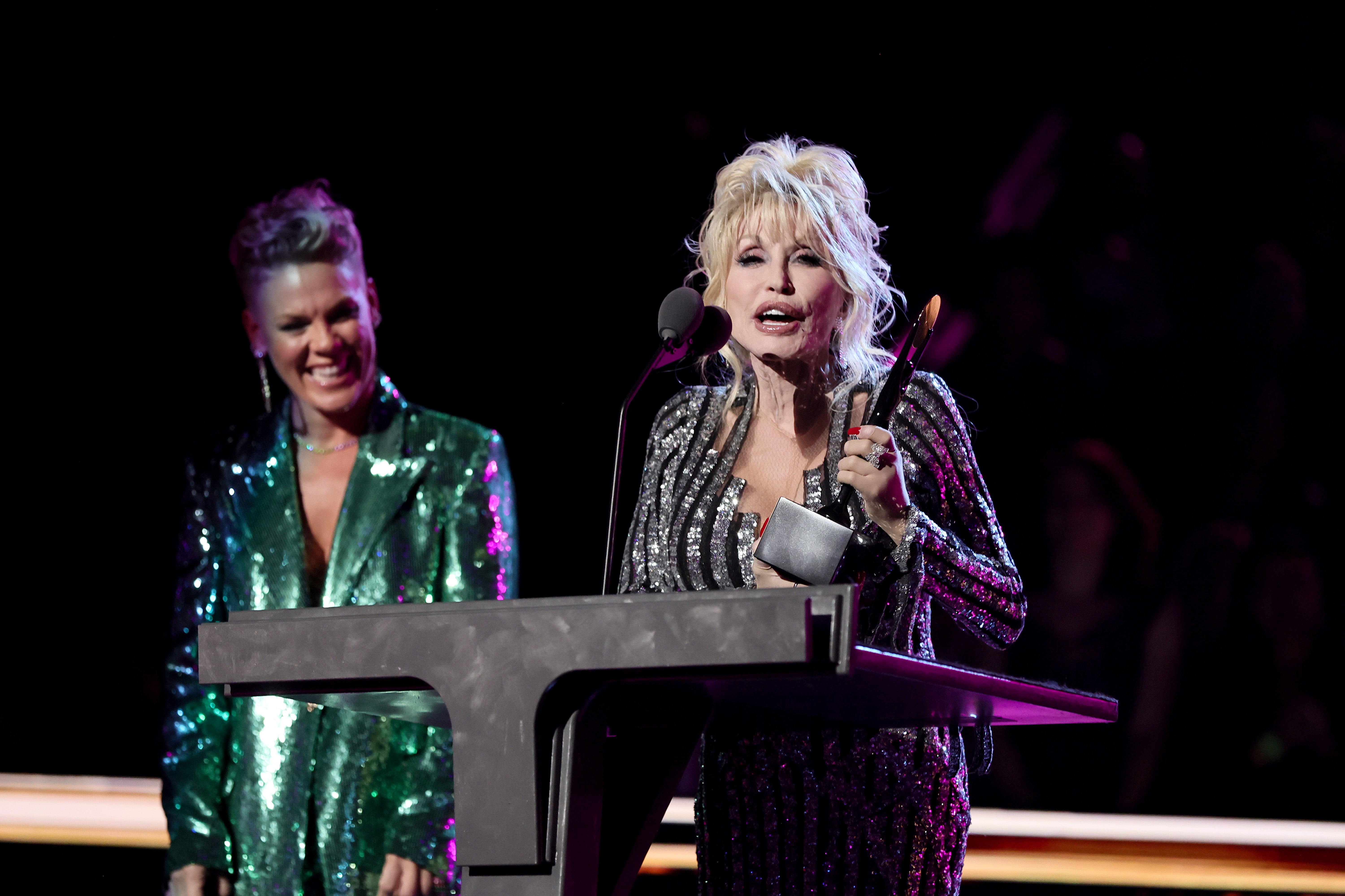 Dolly Parton with the singer Pink being inducted into the Rock & Roll Hall of Fame in November 2022, after initially turning the honor down. She later released a rock’n’roll album, 2023’s ‘Rockstar’