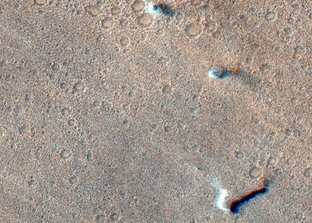 <p>The Colour and Stereo Surface Imaging System (CaSSIS) on board ESA’s ExoMars Trace Gas Orbiter (TGO) captured these three dust devils tracking across the martian surface on 8 November 2021</p>