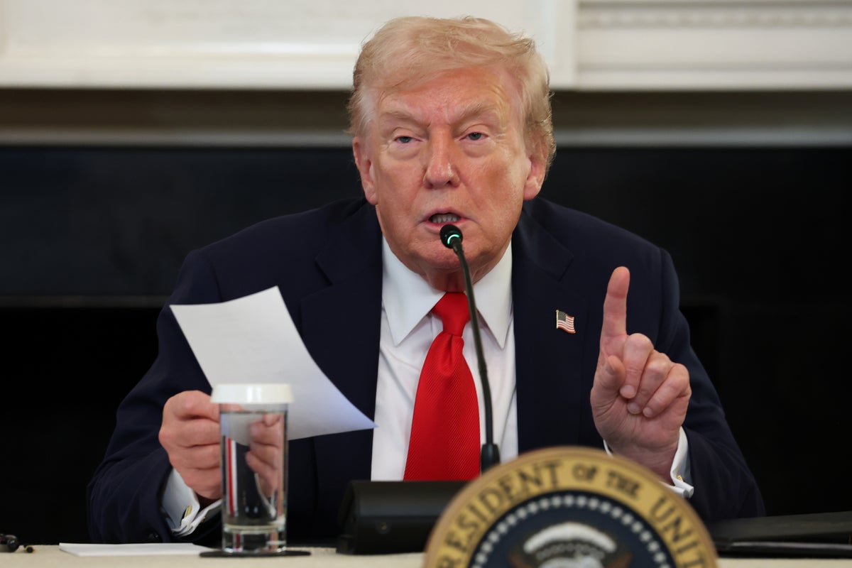 https://static.independent.co.uk/2025/10/08/21/55/President-Donald-Trump-gestures-as-he-reads-a-note-handed-to-him-by-U-S--Secretary-of-State-Marco-Ru.jpeg?trim=75,0,75,0&width=1200&height=800&crop=1200:800