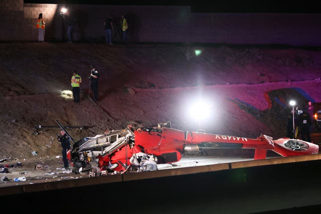 <p>A medical helicopter is shown after it crashed on Highway 50 in Sacramento, California</p>