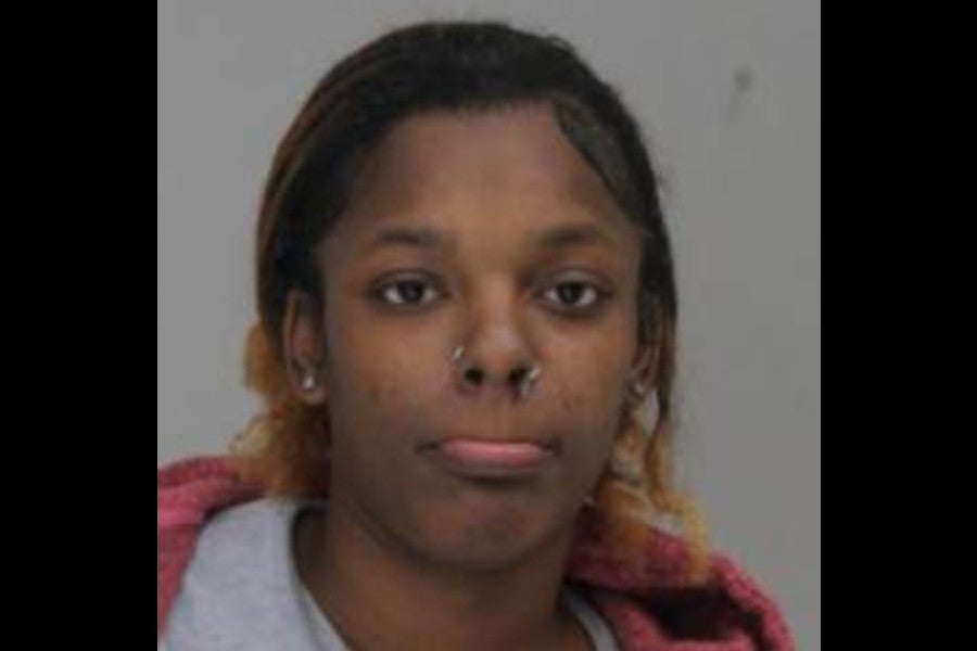 Authorities say Keona Hampton, 22, shot and killed another woman after they got into an argument at a shopping center in Dallas.