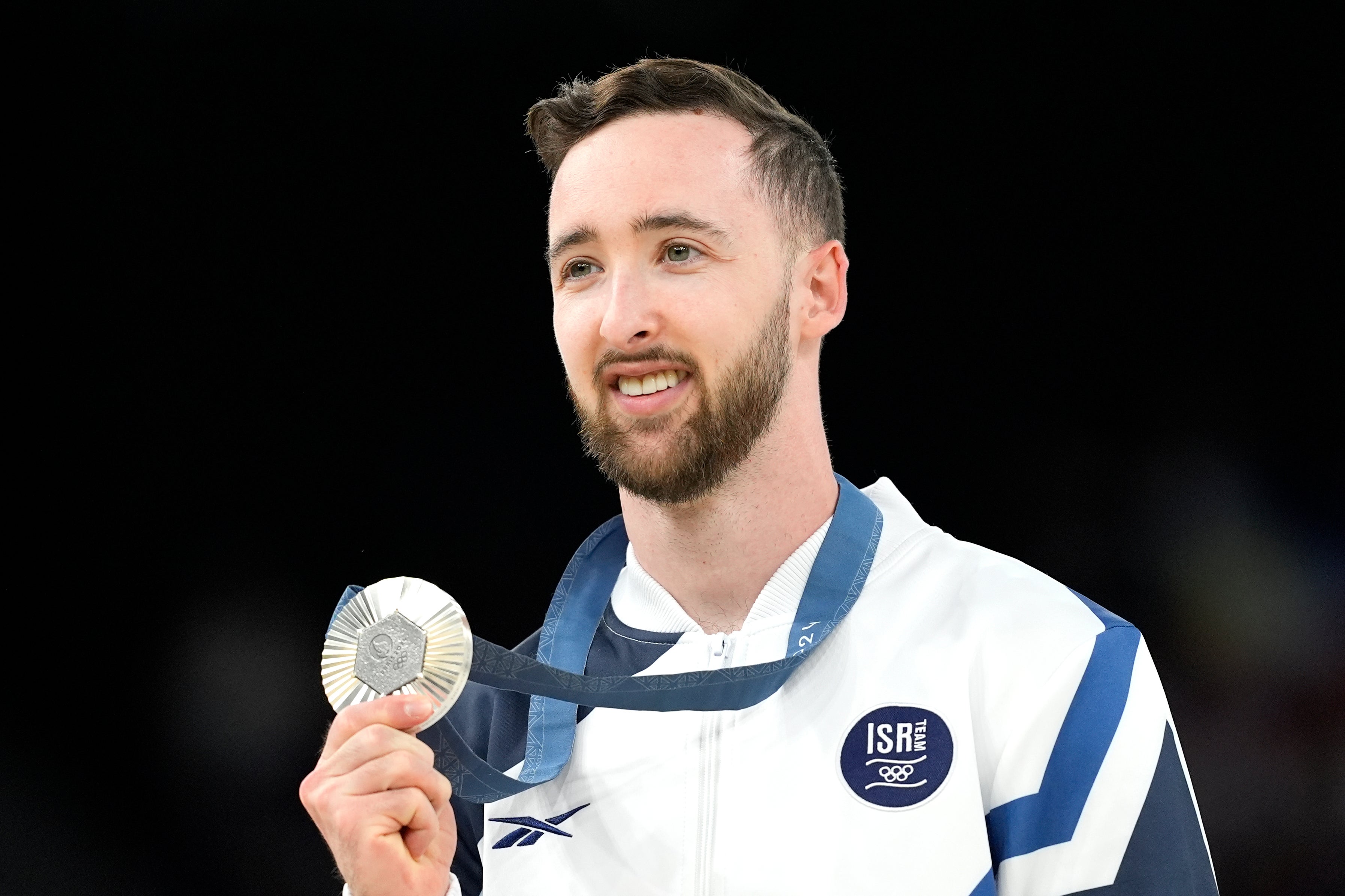 <p>FILE - Artem Dolgopyat of Israel celebrates after winning the silver medal during the men's artistic gymnastics individual floor finals at Bercy Arena at the 2024 Summer Olympics in Paris (AP Photo/Francisco Seco)</p>