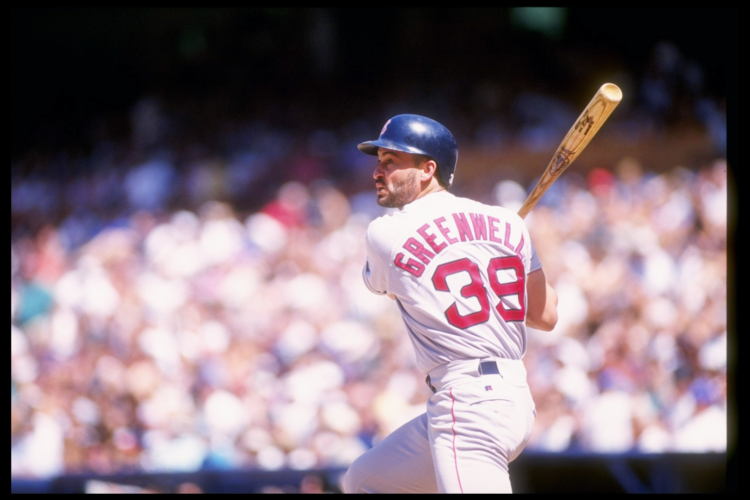 <p>Outfielder Mike Greenwell of the Boston Red Sox takes his turn at bat during a game against the California Angels in 1993</p>