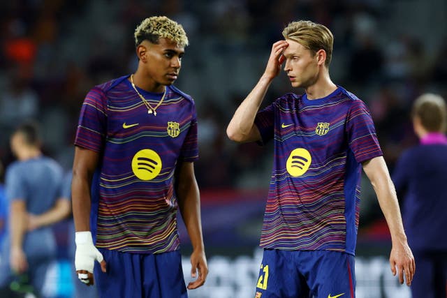 <p>Frenkie de Jong (right) said he did not like the idea of playing league games abroad</p>