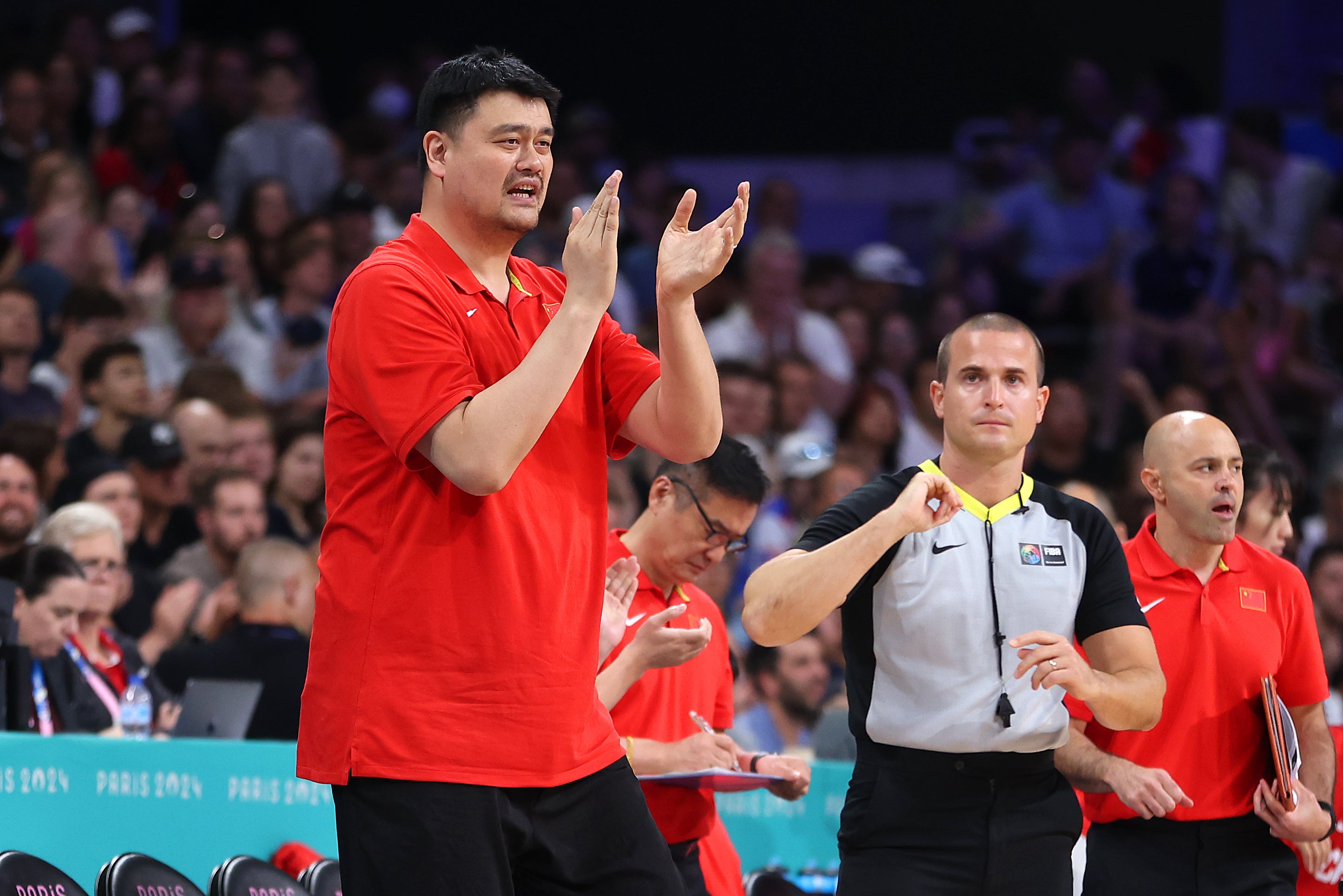 Yao Ming reacts during the Women's Group Phase - Group A match between Team Peopleâs Republic of China and Team Serbia on day five of the Olympic Games Paris 2024 at Stade Pierre Mauroy on July 31, 2024 in Lille, France. (Photo by Gregory Shamus/Getty Images)