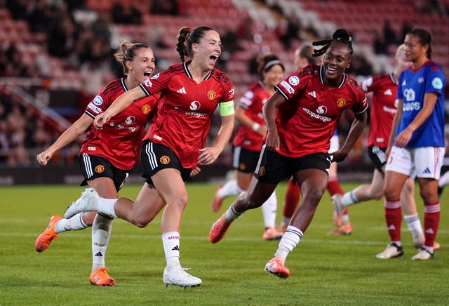 <p>Le Tissier celebrates her opening goal </p>