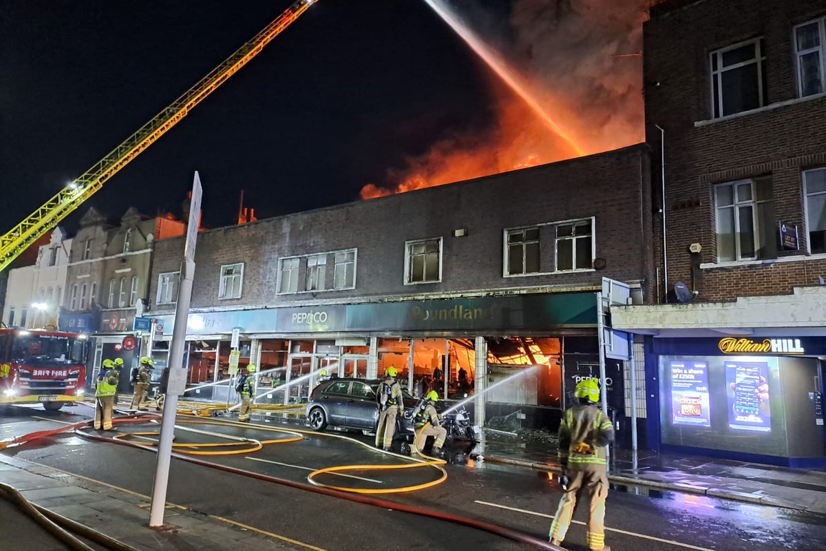 Huge fire at London Poundland shuts high street while 100 firefighters tackle blaze