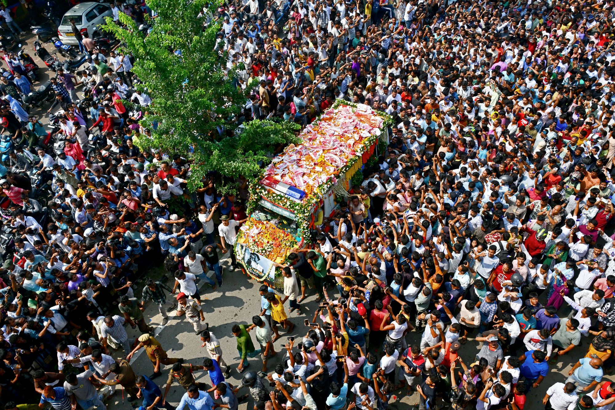 Fans gather to pay their respect to the mortal remains of Indian musician Zubeen Garg at Jalukbari in Guwahati