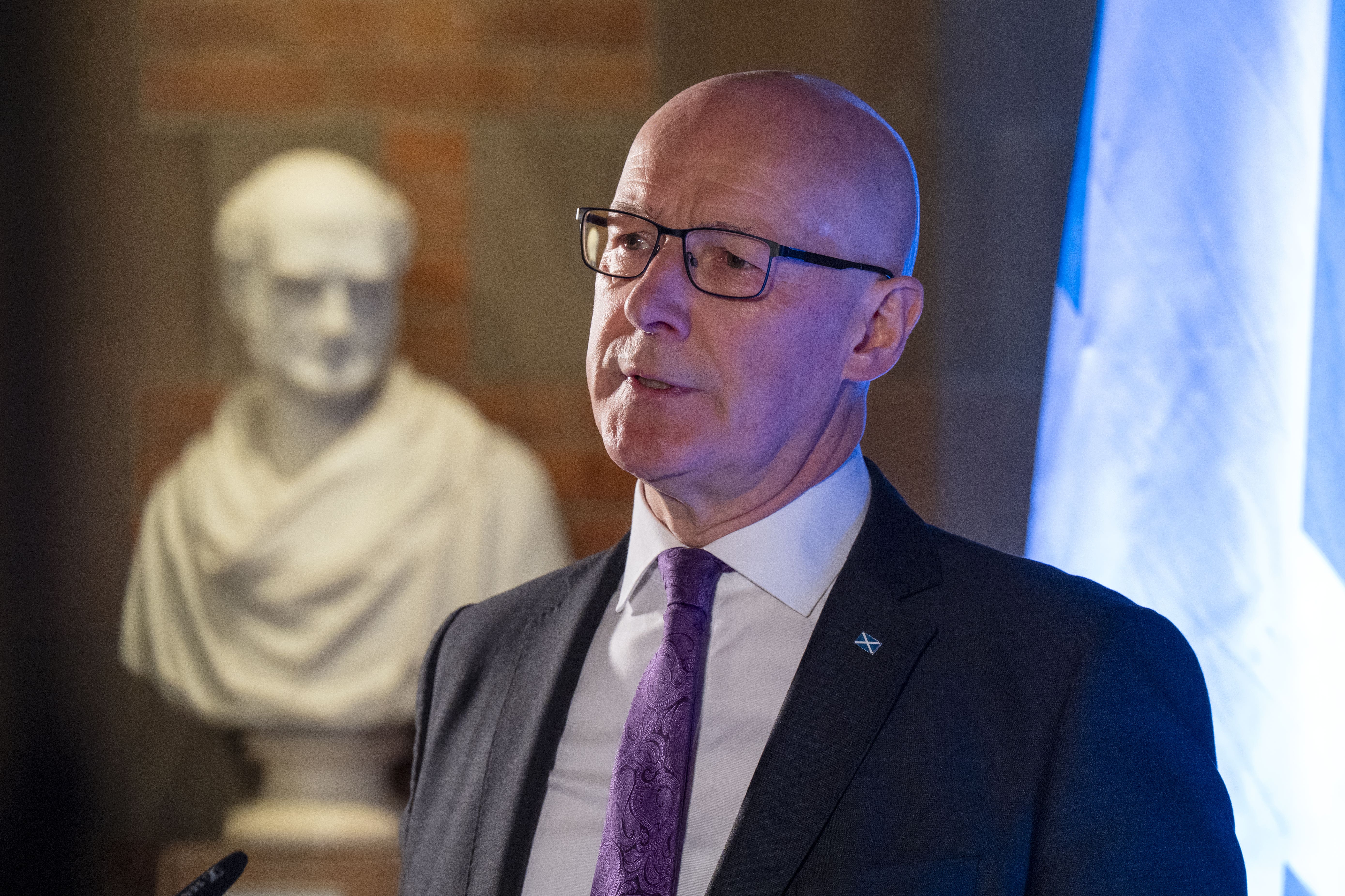 John Swinney was asked whether he backed a pause in asylum seekers coming to Glasgow (Jane Barlow/PA)