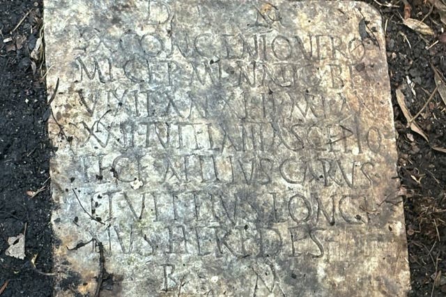 <p>A Latin inscription on the 1,900-year-old grave marker of a Roman sailor named Sextus Congenius Verus, discovered in a New Orleans backyard</p>