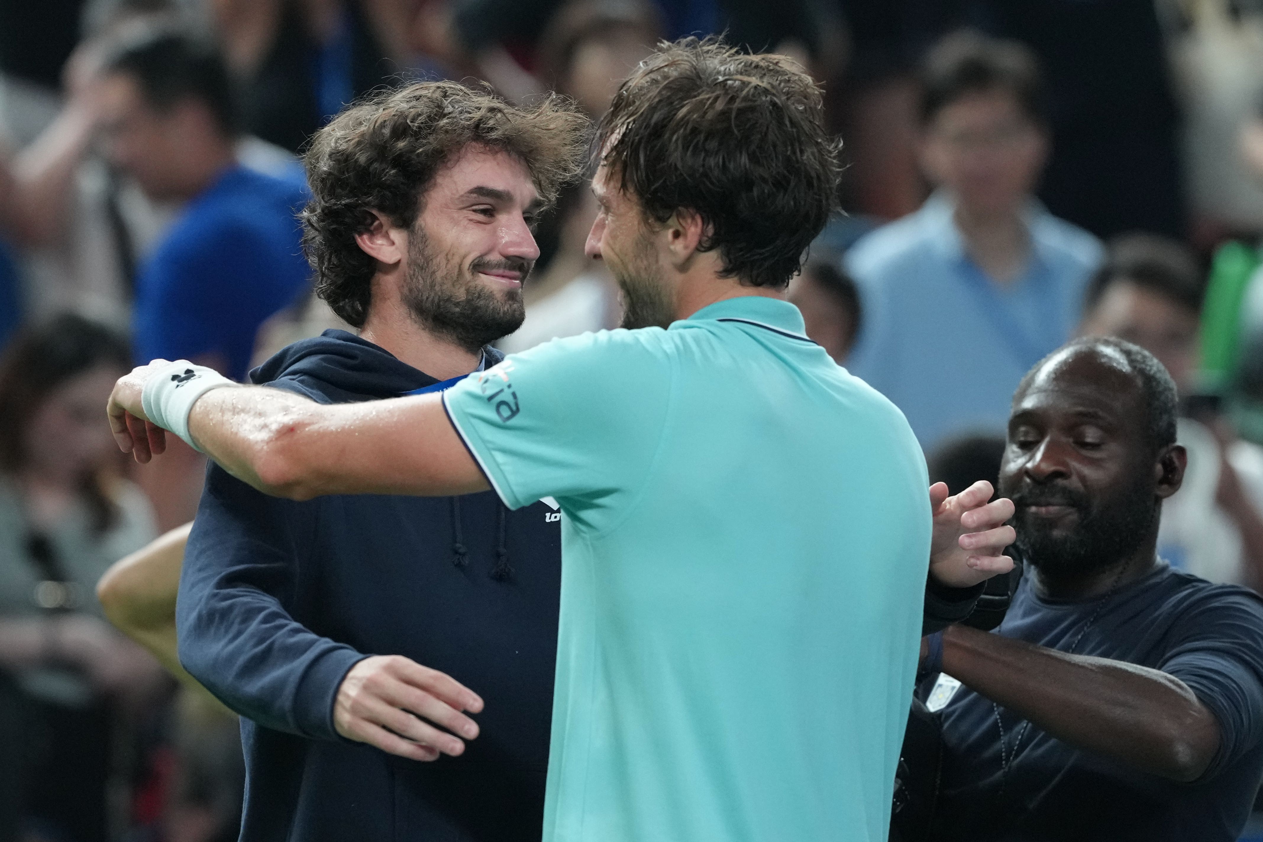 Arthur Rinderknech, right, will face his cousin Valentin Vacherot, left, in the final (Andy Wong/AP)