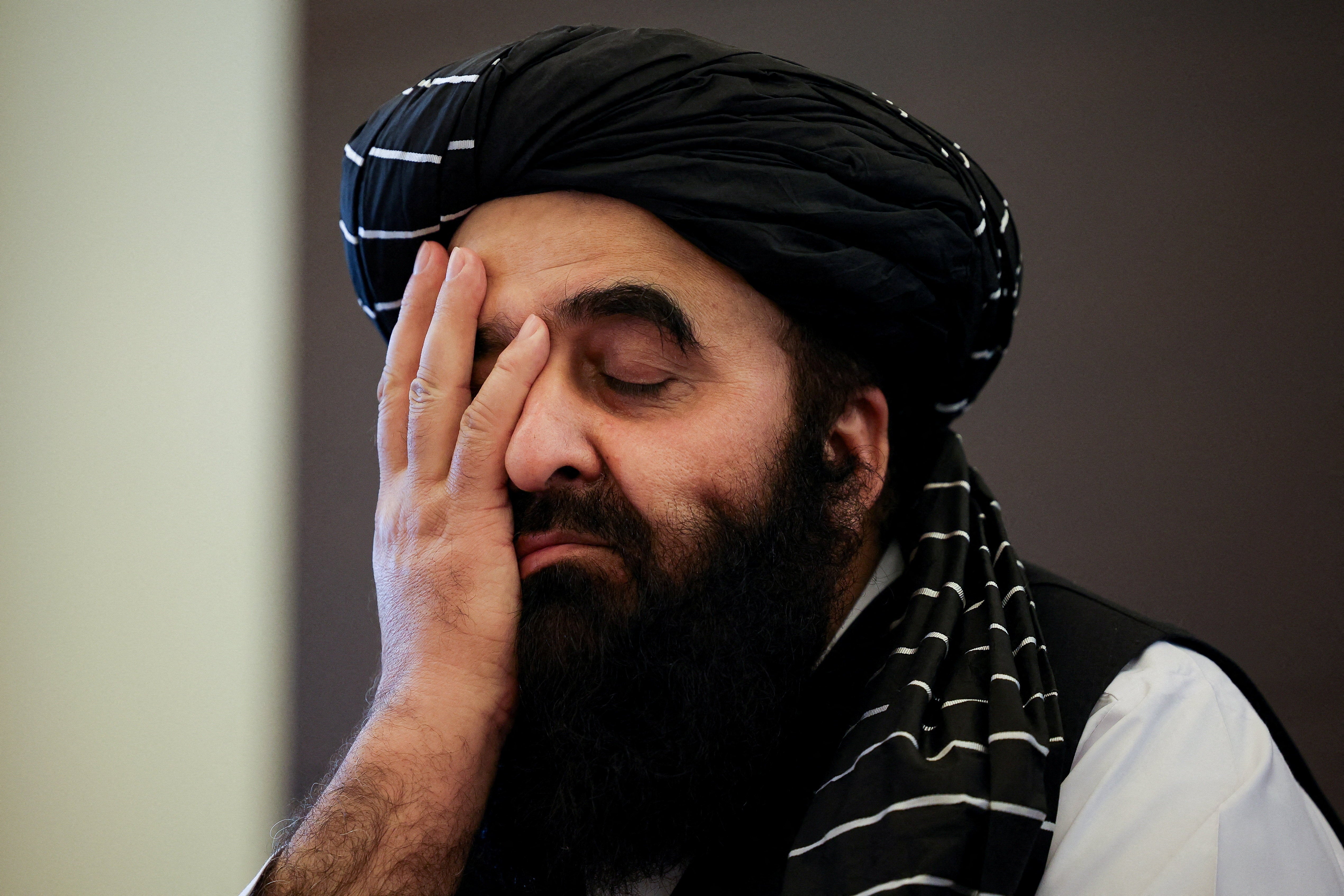 <p>Afghanistan's Taliban Foreign Minister Amir Khan Muttaqi reacts during a press conference, in New Delhi</p>